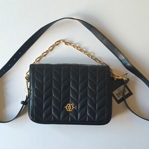 Very elegant and dressy black purse for Women.